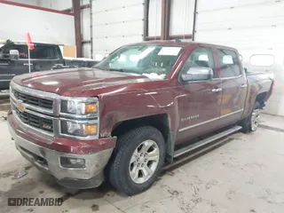 2014 Chevrolet Silverado 1500 LT with VIN 3GCUKREC0EG370483, listed as a IAAI auction lot 41351731 with 70,986 mi miles. Bid and sale history available at carsss.com. Image 2.