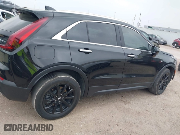 2023 Cadillac XT4 FWD Luxury with VIN 1GYAZAR49PF128552, listed as a IAAI auction lot 41806172 with 36,081 mi miles and . Bid and sale history available at carsss.com. Image 14.
