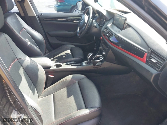 2015 BMW X1 sDrive28i with VIN WBAVM1C59FVW57928, listed as a IAAI auction lot 42056452 with 115,411 mi miles. Bid and sale history available at carsss.com. Image 5.