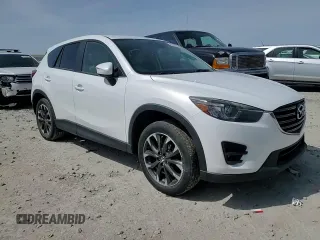2016 Mazda CX-5 Grand Touring with VIN JM3KE4DY3G0688286, listed as a Copart auction lot 52182205 with 194,352 mi miles and Salvage Title. Bid and sale history available at DreamBid. Image 14.