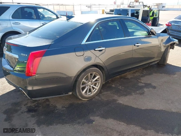 2018 Cadillac CTS Sedan Luxury RWD with VIN 1G6AR5SX3J0185585, listed as a IAAI auction lot 41673223 with NaN miles. Bid and sale history available at carsss.com. Image 4.