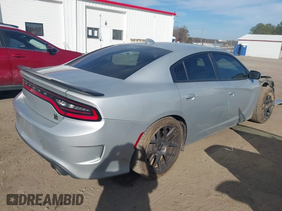 2019 Dodge Charger Scat Pack with VIN 2C3CDXGJXKH599632, listed as a IAAI auction lot 41666680 with 116,995 mi miles and . Bid and sale history available at DreamBid. Image 4.