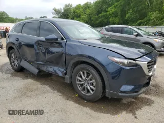2021 Mazda CX-9 Touring with VIN JM3TCACY2M0512867, listed as a Copart auction lot 56646615 with 92,566 mi miles and Salvage title. Bid and sale history available at DreamBid. Image 4.