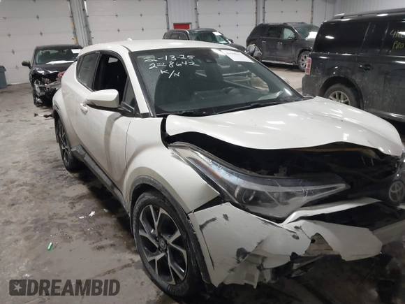 2018 Toyota C-HR XLE with VIN NMTKHMBX5JR027307, listed as a IAAI auction lot 41598077 with 123,032 mi miles. Bid and sale history available at carsss.com. Image 6.