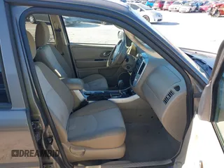 2006 Mercury Mariner Luxury with VIN 4M2YU56156KJ11686, listed as a IAAI auction lot 41854750 with 145,048 mi miles and . Bid and sale history available at DreamBid. Image 5.