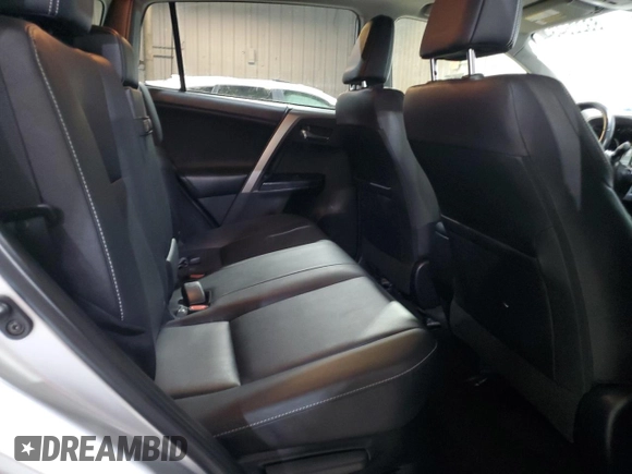2016 Toyota RAV4 Limited with VIN JTMDJREV4GD028877, listed as a Copart auction lot 83225434 with 90,502 mi miles and Salvage title. Bid and sale history available at DreamBid. Image 11.