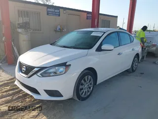 2016 Nissan Sentra S with VIN 3N1AB7AP9GL665997, listed as a IAAI auction lot 42095863 with 96,919 mi miles. Bid and sale history available at carsss.com. Image 2.