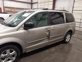 2009 Dodge Grand Caravan SXT z VIN 2D8HN541X9R652097, wystawiony jako IAAI lot #42370946 z przebiegiem 189 911 mil mil oraz . Historia ofert i sprzedaży dostępna na DreamBid. Obrazek 13.