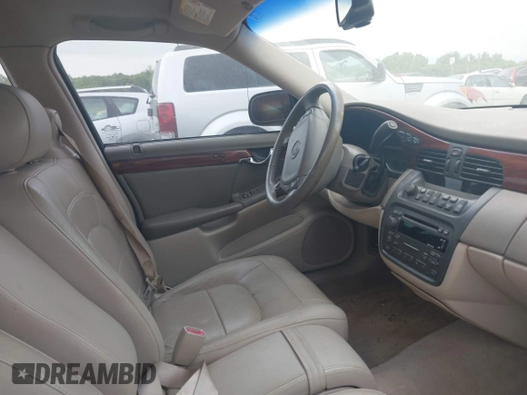 2004 Cadillac DeVille z VIN 1G6KD54Y74U236897, wystawiony jako IAAI lot #42058904 z przebiegiem 75 226 mil mil oraz . Historia ofert i sprzedaży dostępna na DreamBid. Obrazek 5.