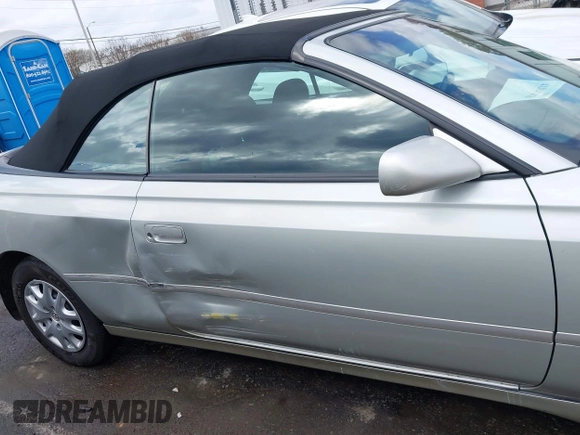 2003 Toyota Solara SE with VIN 2T1FE22P03C020017, listed as a IAAI auction lot 41841063 with 62,059 mi miles. Bid and sale history available at carsss.com. Image 13.