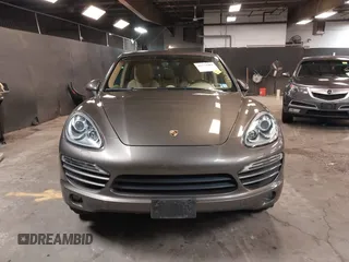2014 Porsche Cayenne with VIN WP1AA2A26ELA93026, listed as a IAAI auction lot 42272409 with 58,951 mi miles and . Bid and sale history available at DreamBid. Image 12.