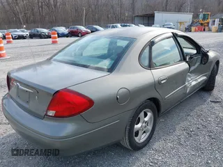 2002 Ford Taurus SE Standard with VIN 1FAFP53U72A145136, listed as a IAAI auction lot 41768868 with 209,765 mi miles and . Bid and sale history available at DreamBid. Image 4.