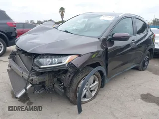 2019 Honda HR-V EX with VIN 3CZRU5H55KM718842, listed as a IAAI auction lot 42022063 with 59,610 mi miles. Bid and sale history available at carsss.com. Image 2.