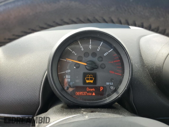 2015 MINI Countryman with VIN WMWZB3C50FWR44801, listed as a Copart auction lot 51957715 with 69,537 mi miles and Salvage Title. Bid and sale history available at DreamBid. Image 9.