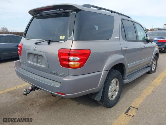 2001 Toyota Sequoia Limited with VIN 5TDBT48AX1S001532, listed as a IAAI auction lot 41543630 with 212,640 mi miles. Bid and sale history available at carsss.com. Image 4.
