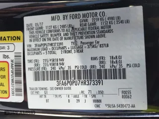 2017 Ford Fusion Energi SE with VIN 3FA6P0PU7HR373391, listed as a IAAI auction lot 41677525 with 99,499 mi miles. Bid and sale history available at carsss.com. Image 9.