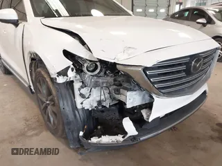 2017 Mazda CX-9 Grand Touring with VIN JM3TCADY5H0132572, listed as a IAAI auction lot 41421008 with 66,656 mi miles and . Bid and sale history available at DreamBid. Image 6.