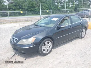 2005 Acura RL z VIN JH4KB16545C018873, wystawiony jako IAAI lot #42423476 z przebiegiem 237 834 mil mil oraz . Historia ofert i sprzedaży dostępna na DreamBid. Obrazek 17.