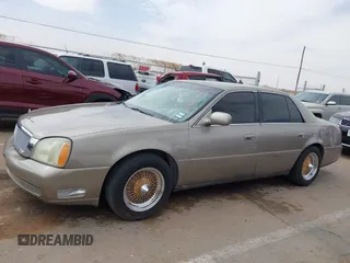 2003 Cadillac DeVille z VIN 1G6KD54Y63U223640, wystawiony jako IAAI lot #41704549 z przebiegiem 127 981 mil mil oraz . Historia ofert i sprzedaży dostępna na DreamBid. Obrazek 14.
