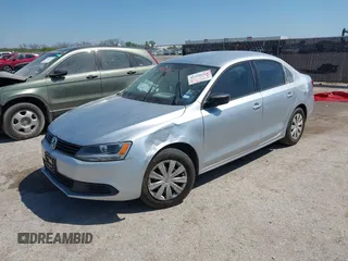 2014 Volkswagen Jetta Sedan S with VIN 3VW2K7AJ3EM310020, listed as a IAAI auction lot 41338164 with 76,456 mi miles. Bid and sale history available at carsss.com. Image 2.