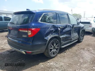 2019 Honda Pilot Touring 7-Passenger z VIN 5FNYF6H63KB000365, wystawiony jako IAAI lot #42154822 z przebiegiem 238 032 mil mil oraz . Historia ofert i sprzedaży dostępna na DreamBid. Obrazek 4.