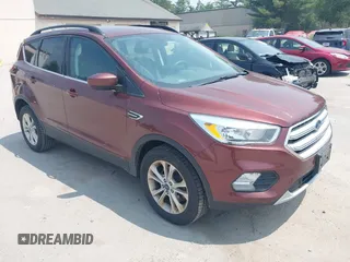 2018 Ford Escape SE z VIN 1FMCU9GD8JUB18379, wystawiony jako IAAI lot #42477461 z przebiegiem 133 080 mil mil oraz . Historia ofert i sprzedaży dostępna na DreamBid. Obrazek 1.