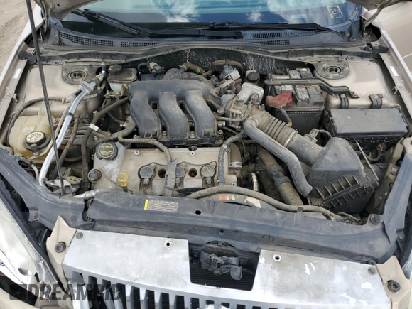 2008 Mercury Milan Premier z VIN 3MEHM08148R639125, wystawiony jako Copart lot #56798705 z przebiegiem 115 428 mil mil oraz Szkoda całkowita • Salvage title. Historia ofert i sprzedaży dostępna na DreamBid. Obrazek 11.