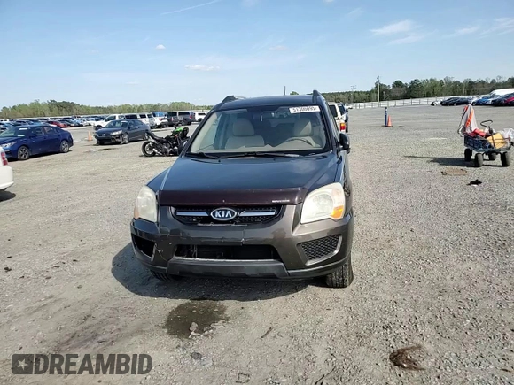 2009 Kia Sportage LX with VIN KNDJF724297573255, listed as a Copart auction lot 51300095 with 199,362 mi miles and Salvage Title. Bid and sale history available at carsss.com. Image 11.