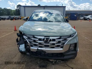 2023 Hyundai Santa Cruz SE z VIN 5NTJA4AE7PH069415, wystawiony jako Copart lot #56434945 z przebiegiem 43 866 mil mil oraz Szkoda całkowita • Salvage title. Historia ofert i sprzedaży dostępna na DreamBid. Obrazek 5.