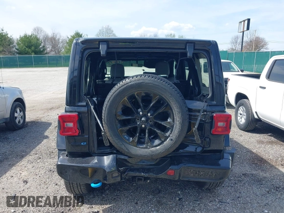 2021 Jeep Wrangler Unlimited Sahara with VIN 1C4JJXP63MW767719, listed as a IAAI auction lot 41906155 with 44,689 mi miles and . Bid and sale history available at DreamBid. Image 16.