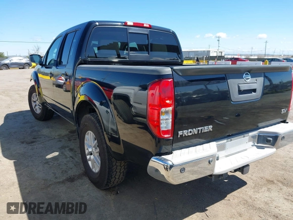 2015 Nissan Frontier SV with VIN 1N6AD0ER8FN750142, listed as a IAAI auction lot 41921446 with 85,591 mi miles and . Bid and sale history available at DreamBid. Image 3.