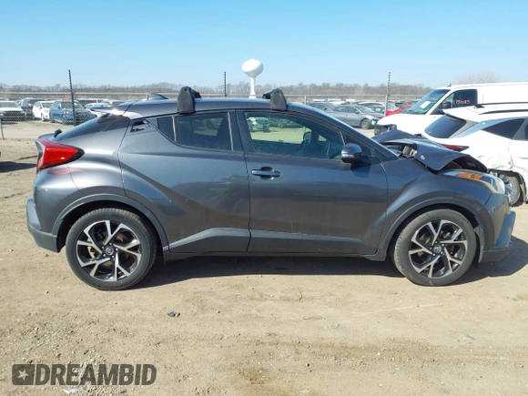 2019 Toyota C-HR XLE with VIN JTNKHMBX4K1025527, listed as a IAAI auction lot 41807738 with 64,505 mi miles and . Bid and sale history available at DreamBid. Image 14.