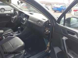 2021 Volkswagen Tiguan SE with VIN 3VV2B7AX4MM050282, listed as a IAAI auction lot 42124808 with 80,082 mi miles and . Bid and sale history available at DreamBid. Image 5.
