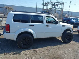 2011 Dodge Nitro Heat with VIN 1D4PT4GK9BW596989, listed as a IAAI auction lot 42397427 with 158,609 mi miles and . Bid and sale history available at DreamBid. Image 13.