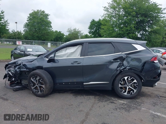 2023 Kia Sportage EX with VIN KNDPVCAG1P7110909, listed as a IAAI auction lot 42646436 with 16,304 mi miles and . Bid and sale history available at DreamBid. Image 14.