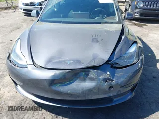 2023 Tesla Model 3 with VIN 5YJ3E1EA6PF645110, listed as a IAAI auction lot 42044357 with 24,352 mi miles and . Bid and sale history available at DreamBid. Image 6.
