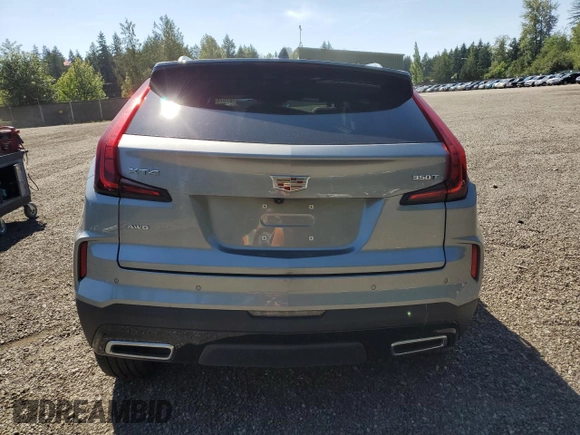 2024 Cadillac XT4 AWD Premium Luxury z VIN 1GYFZDR40RF199813, wystawiony jako Copart lot #57576305 z przebiegiem 586 mil mil oraz Nie do naprawy • Non repairable. Historia ofert i sprzedaży dostępna na DreamBid. Obrazek 6.