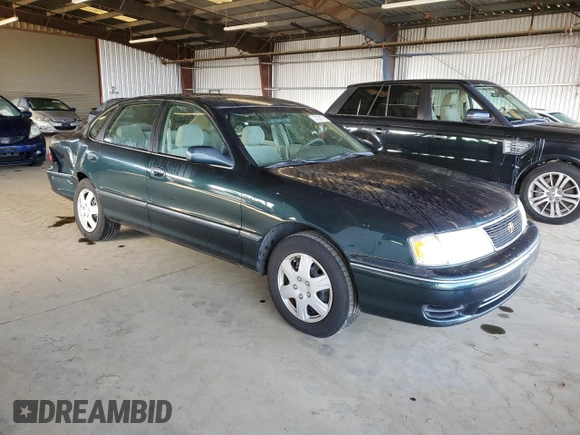 1998 Toyota Avalon XL with VIN 4T1BF18B1WU265039, listed as a Copart auction lot 52356785 with 375,814 mi miles and Salvage Title. Bid and sale history available at DreamBid. Image 4.
