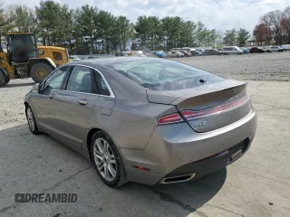 2015 Lincoln MKZ z VIN 3LN6L2JK8FR627515, wystawiony jako Copart lot #52790875 z przebiegiem 80 810 mil mil oraz Szkoda całkowita • Salvage title. Historia ofert i sprzedaży dostępna na DreamBid. Obrazek 2.