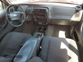 2002 Ford Ranger XLT Appearance with VIN 1FTYR44E32PA07430, listed as a Copart auction lot 54067335 with 209,433 mi miles and Salvage title. Bid and sale history available at DreamBid. Image 8.