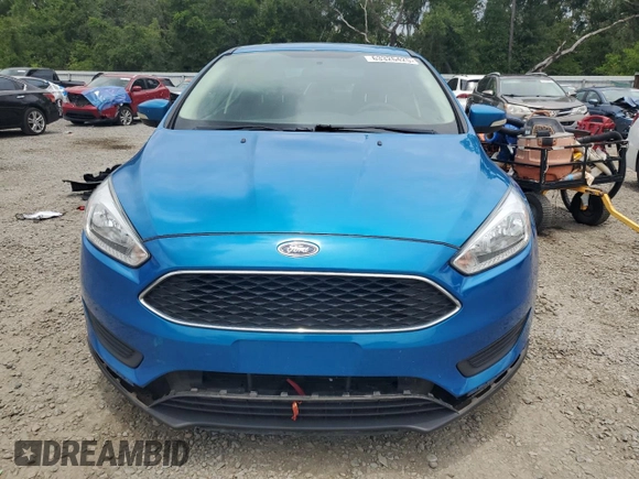 2016 Ford Focus SE z VIN 1FADP3F21GL386580, wystawiony jako Copart lot #63326425 z przebiegiem 82 139 mil mil oraz Szkoda całkowita • Salvage title. Historia ofert i sprzedaży dostępna na DreamBid. Obrazek 5.