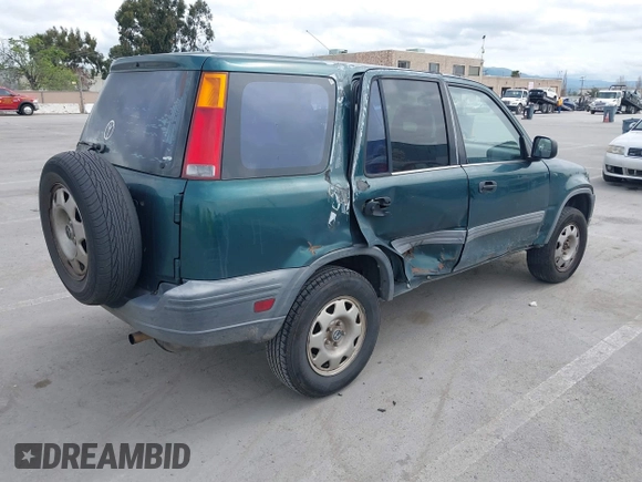 1999 Honda CR-V LX with VIN JHLRD2847XC014469, listed as a IAAI auction lot 41987027 with 307,727 mi miles. Bid and sale history available at carsss.com. Image 4.