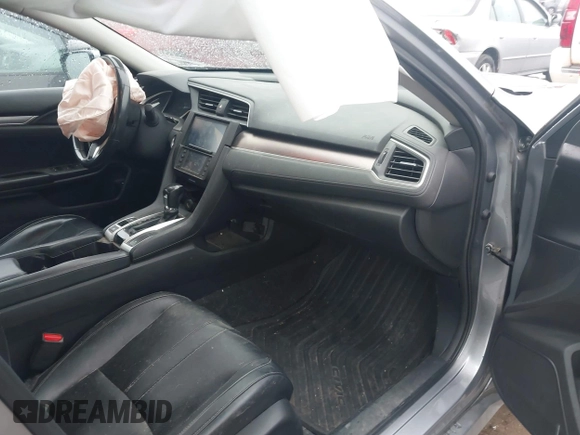 2016 Honda Civic EX-L z VIN 19XFC1F70GE003249, wystawiony jako IAAI lot #42430548 z przebiegiem 103 002 mil mil oraz . Historia ofert i sprzedaży dostępna na DreamBid. Obrazek 5.