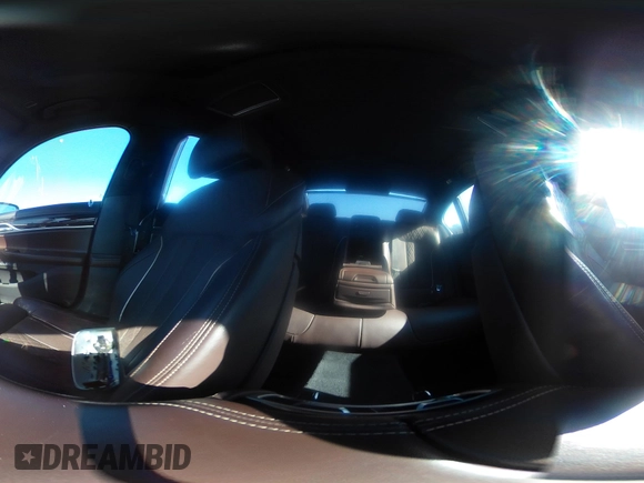 2017 BMW 7 Series 750i with VIN WBA7F0C34HGM21738, listed as a IAAI auction lot 41772933 with 62,923 mi miles and . Bid and sale history available at DreamBid. Image 18.