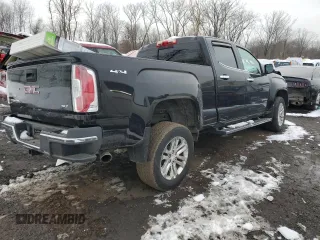 2015 GMC Canyon 4WD SLT with VIN 1GTG6CE35F1236096, listed as a Copart auction lot 44036465 with 55,829 mi miles and Salvage Title. Bid and sale history available at carsss.com. Image 3.