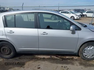 2009 Nissan Versa 1.8 SL with VIN 3N1BC13E49L388740, listed as a IAAI auction lot 41966343 with 125,780 mi miles. Bid and sale history available at carsss.com. Image 13.