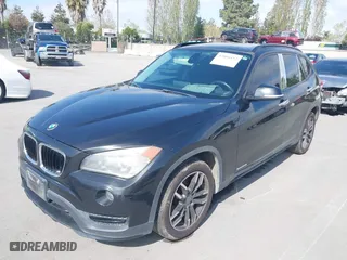2015 BMW X1 sDrive28i with VIN WBAVM1C59FVW57928, listed as a IAAI auction lot 42056452 with 115,411 mi miles. Bid and sale history available at carsss.com. Image 6.