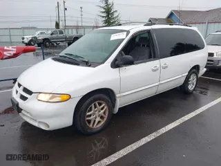 1999 Dodge Caravan SE with VIN 2B4GP44GXXR285795, listed as a IAAI auction lot 41850278 with 2,552,594 mi miles. Bid and sale history available at carsss.com. Image 2.