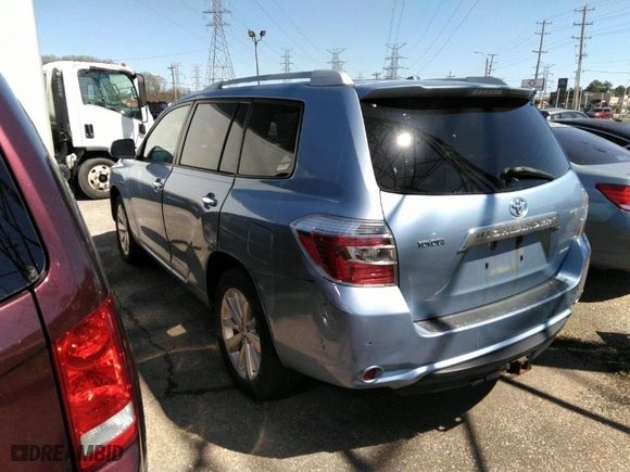 2009 Toyota Highlander Hybrid Limited with VIN JTEEW44A392028371, listed as a IAAI auction lot 41826565 with 210,309 mi miles. Bid and sale history available at carsss.com. Image 14.