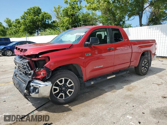 2021 Toyota Tundra SR with VIN 5TFUY5F11MX971951, listed as a Copart auction lot 64889875 with 69,297 mi miles and Salvage title. Bid and sale history available at DreamBid. Image 1.
